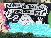 Courtney Hicks<br/>2021 - 2022<br/><span style= "font-size: 6pt">33.752034907412366, -84.36421416699942</span> Street Art Mural formerly in Cabbagetown Atlanta by Courtney Hicks featuring a woman in water