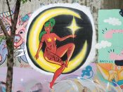 Ale' Hernandez-Lopez<br/>2021 - 2023<br/><span style= "font-size: 6pt">33.751752546622235, -84.36546407902333</span> Street Art Mural formerly in Cabbagetown Atlanta by Ale' Hernandez-Lopez featuring a red woman on the moon