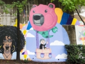 Alex Ferror<br/>2021 - 2023<br/><span style= "font-size: 6pt">33.751690555829995, -84.36566048431139</span> Street Art Mural formerly in Cabbagetown Atlanta by Alex Ferror featuring a bear balloon with 70Dot