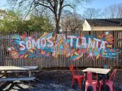 Angie Jerez<br/>2021 - 2023<br/><span style= "font-size: 6pt">33.749522, -84.342990</span> Street Art Mural formerly in Edgewood Atlanta by Angie Jerez featuring " Somos Atlanta"