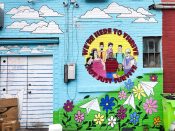 Jessica Blinkhorn<br/>2022 - 2026<br/><span style= "font-size: 6pt">33.74085702144622, -84.34671931088289</span> Street Art Mural formerly in East Atlanta by Jessica Blinkhorn featuring "we're here to thrive"