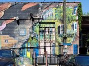 Artist ?<br/>2022 - 2024<br/><span style= "font-size: 6pt">33.7632578402317, -84.35131976890575</span> Street Art Mural formerly in Little Five Points Atlanta by an unknown artist featuring a building and palm trees