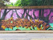 VAYNE, Unoe, & @dazetn<br/>2022 - 2023<br/><span style= "font-size: 6pt">33.72831411042269, -84.36376600610252</span> Graffiti Piece formerly on the BeltLine in Grant Park Atlanta by VAYNE, Unoe, and @dazetn featuring a book and a spray can cap