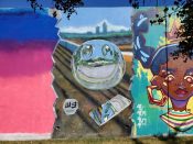 Matt Evans<br/>2021 - 2023<br/><span style= "font-size: 6pt">33.752419897789764, -84.3627406546998</span> Street Art Mural formerly in Cabbagetown Atlanta by Matt Evans featuring a reflective smiley face