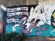 Courtney Hicks<br/>2022 - 2023<br/><span style= "font-size: 6pt">33.752034907412366, -84.36421416699942</span> Street Art Mural formerly in Cabbagetown Atlanta by Courtney Hicks featuring a wolf