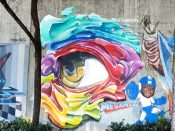 Julio Ceballos<br/>2022 - 2023<br/><span style= "font-size: 6pt">33.75203646841102, -84.3643171209893</span> Street Art Mural formerly in Cabbagetown Atlanta by Julio Ceballos featuring an eye