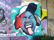 C. Flux Sing (Craig Singleton)<br/>2022 - 2024<br/><span style= "font-size: 6pt">33.751963486540916, -84.36452877377134</span> Street Art Mural formerly in Cabbagetown Atlanta by C. Flux Sing (Craig Singleton) featuring a man with headphones