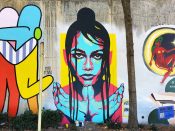 Aziza Andre'<br/>2022 - 2024<br/><span style= "font-size: 6pt">33.7517232908444, -84.36550832681775</span> Street Art Mural formerly in Cabbagetown Atlanta by Aziza Andre' featuring a woman's face