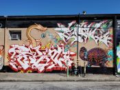 Artist ?<br/>2022 - 2023<br/><span style= "font-size: 6pt">33.766727432254555, -84.34969120110455</span> Graffiti Pieces formerly in Little Five Points Atlanta by unknown writers featuring a dragon and another odd creature