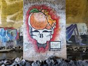 Artist ?<br/>2020? - 2024<br/><span style= "font-size: 6pt">33.728010393790846, -84.41690232156093</span> Street Art Mural formerly on the Beltline in West End Atlanta by an unknown artist featuring a peach skull