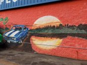 Jarrett Becke<br/>2014 - 2025<br/><span style= "font-size: 6pt">33.81542401425225, -84.26923862857497</span> Street art mural formerly in northeast Atlanta by Jarrett Becke featuring a car