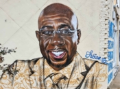 Fabian Williams<br/>2022 - 2023<br/><span style= "font-size: 6pt">33.743216643585576, -84.4375393049853</span> Street Art Mural formerly in Westview Atlanta by Fabian Williams featuring Raphael Warnock