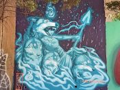 Amy Ashbaugh<br/>2018 - 2023<br/><span style= "font-size: 6pt">33.751846523184334, -84.36495924636422</span> Street Art Mural formerly in Cabbagetown Atlanta by Amy Ashbaugh featuring a woman and wolves