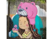 Alex Ferror<br/>2023 - 2025<br/><span style= "font-size: 6pt">33.751690555829995, -84.36566048431139</span> Street Art Mural formerly in Cabbagetown Atlanta by Alex Ferror featuring a girl holding a teddy bear