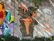 Jonny Warren<br/>2023 - 2025<br/><span style= "font-size: 6pt">33.75197162584102, -84.36449110929466</span> Street Art Mural formerly in Cabbagetown Atlanta by Jonny Warren featuring a bird and a sunrise