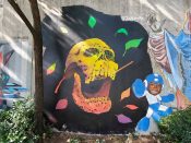 Julio Ceballos<br/>2023 - 2024<br/><span style= "font-size: 6pt">33.75200601204792, -84.3643372195595</span> Street Art Mural formerly in Cabbagetown Atlanta by Julio Ceballos featuring a skull