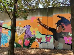 Street Art Mural formerly in Cabbagetown Atlanta by Roger Parrilla, Tom Davii, and Charity Hamidullah featuring a letter in an envelope