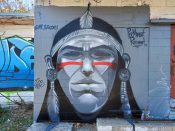 Mr. Autograph<br/>2023 - 2025<br/><span style= "font-size: 6pt">33.76892429290751, -84.4049581791807</span> Street Art Mural formerly in English Avenue Atlanta by Mr. Autograph featuring a Native American