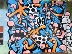 Street Art Mural formerly in Cabbagetown Atlanta by Aesek featuring barbed wire and abstract patterns
