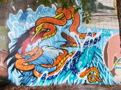 Chris Alvarez and Courtney Hicks<br/>2024 - 2025<br/><span style= "font-size: 6pt">33.752034907412366, -84.36421416699942</span> Street Art Mural formerly in Cabbagetown Atlanta by Chris Alvarez and Courtney Hicks featuring a snake and a bird