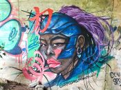 Jamal Sullivan<br/>2024 - 2024<br/><span style= "font-size: 6pt">33.728058872260625, -84.41688307047423</span> Street Art Mural formerly on the BeltLine in West End Atlanta by Jamal Sullivan featuring a woman wearing a helmet