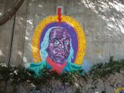 Carl Janes<br/>2015 - 2022<br/><span style= "font-size: 6pt">33.75208531486498, -84.36397686249299</span> Street Art Mural formerly in Cabbagetown Atlanta by Carl Janes featuring Ben Franklin in purple