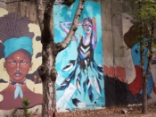 Lauren Pallotta Stumberg<br/>2016 - 2020<br/><span style= "font-size: 6pt">33.75212353055605, -84.36388249762172</span> Street Art Mural formerly in Cabbagetown Atlanta by Lauren Pallotta Stumberg featuring a woman wearing feathers