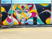 Sanithna Pahnsavanh<br/>2016 - 2018<br/><span style= "font-size: 6pt">33.753504336608714, -84.34940697269835</span> Street art mural formerly in Reynoldstown Atlanta by Sanithna Phansavanh featuring a multi-color woman's face