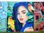 Nicole Merizalde and Trudy Tran<br/>2025 - 2025<br/><span style= "font-size: 6pt">33.75249663747286, -84.36239631793339</span> Street Art Mural formerly in Cabbagetown Atlanta by Nicole Merizalde and Trudy Tran featuring a woman with blue hair and birds