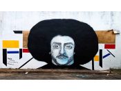 Yuzly Mathurin<br/>2019 - <br/><span style= "font-size: 6pt">33.7069279910502, -84.37951719335993</span> Street Art mural formerly in Lakewood Heights Atlanta by Yuzly Mathurin featuring Colin Kaepernick