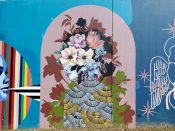 Janice Rago<br/>2022 - 2025<br/><span style= "font-size: 6pt">33.75234094948621, -84.36299393252965</span> Street Art Mural formerly in Cabbagetown Atlanta by Janice Rago featuring a woman and flowers