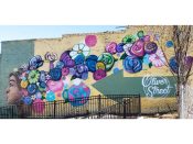 Eric Nine<br/>2019 - 2020<br/><span style= "font-size: 6pt">33.773231723247946, -84.4146403210041</span> Street Art Mural formerly in English Avenue Atlanta by Eric Nine featuring a face and flowers