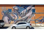 Taylor White<br/>2015 - 2019<br/><span style= "font-size: 6pt">33.77955264247687, -84.4092730461373</span> Street Art Mural formerly in West Midtown Atlanta by Taylor White featuring a person tied up with blue ropes