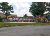 Lee Arnett<br/>2016 - 2025<br/><span style= "font-size: 6pt">33.750851381107516, -84.402011445728</span> Street Art Mural formerly in Castleberry Hill Atlanta by Lee Arnett featuring the text "welcome to castleberry hill" on a multicolor background