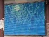 Lydia Futral<br/>2017 - 2021<br/><span style= "font-size: 6pt">33.75229159356902,-84.39276440471025</span> Street Art Mural formerly in Downtown Atlanta by Lydia Futral featuring a swimmer and fish