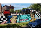 Chris Veal<br/>2017 - 2022<br/><span style= "font-size: 6pt">33.74941574966067, -84.36839468779573</span> Street Art Mural formerly in Cabbagetown Atlanta by Chris Veal featuring two faces and the year 1986