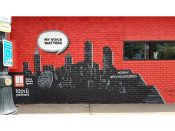 Tes Arlette<br/>2019 - 2020<br/><span style= "font-size: 6pt">33.78169501132694, -84.38023110643996</span> Street Art Mural formerly in Midtown Atlanta by Tes Arlette featuring an Atlanta skyline