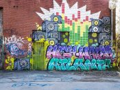 Dr. Dax (Dax Rudnak)<br/>2017? - 2021<br/><span style= "font-size: 6pt">33.739824169557586,-84.41178768855468</span> Street Art Mural formerly in Adair Park Atlanta by Dr. Dax featuring a stack of speakers