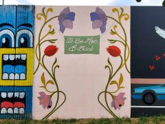 Street Art Mural formerly in Cabbagetown Atlanta by Dana Harrison featuring "to the moon & back"