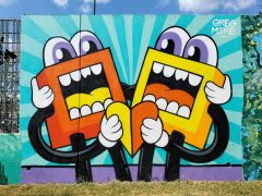 Street Art Mural formerly in Cabbagetown Atlanta by Greg Mike featuring two Larry Loudmouf characters.