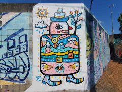 Kyle Brooks<br/>2025 - <br/><span style= "font-size: 6pt">33.751391675247525, -84.36657509889669</span> Street Art Mural in Cabbagetown Atlanta by Kyle Brooks featuring a character containing a landscape scene