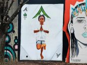 Quake<br/>2024 - 2025<br/><span style= "font-size: 6pt">33.751549099188125, -84.3662910213851</span> Street Art Mural formerly by Quake in Cabbagetown Atlanta featuring the artist's son