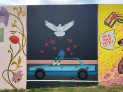 Noé Alarcon<br/>2025 - <br/><span style= "font-size: 6pt">33.75246004145718, -84.36253643176391</span> Street Art Mural in Cabbagetown Atlanta by Noé Alarcon featuring a person sitting on a car