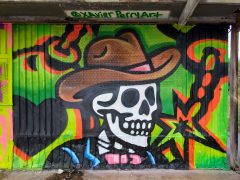 Xavier Perry<br/>2025 - <br/><span style= "font-size: 6pt">33.73533320010427, -84.40526753102243</span> Street Art Mural in Pittsburgh Atlanta by Xavier Perry featuring a skull with a hat