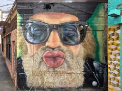 @enyaw_b<br/>2026 - <br/><span style= "font-size: 6pt">33.763558222356075, -84.35141684899614</span> Street Art Mural in Little Five Points Atlanta by @enyaw_b featuring a memorial to Brent Hinds