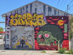 Tanner Wilson and SAYER<br/>2026 - <br/><span style= "font-size: 6pt">33.747577145846755, -84.35079929563796</span> Graffiti Piece by SAYER and Street Art Mural by Tanner Wilson in Reynoldstown Atlanta featuring a skull