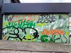 Xavier Perry<br/>2026 - <br/><span style= "font-size: 6pt">33.764624430622575, -84.35002830568953</span> Street Art Mural by Xavier Perry featuring "filthy wealth"