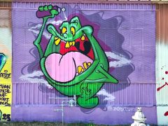 Jack Harrison<br/>2026 - <br/><span style= "font-size: 6pt">33.73516513691736, -84.40517863482486</span> Street Art Mural in Pittsburgh Atlanta by Jack Harrison featuring Slimer from Ghostbusters