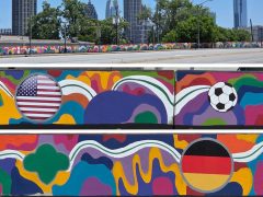 Melissa A. Mitchell<br/>2026 - <br/><span style= "font-size: 6pt">33.79125723314142, -84.4051308174015</span> Street Art Mural in West Midtown Atlanta by Melissa A. Mitchell featuring soccer balls and flags