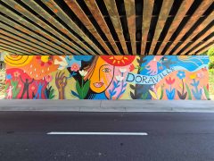 Teresa Abboud<br/>2026 - <br/><span style= "font-size: 6pt">33.90467452975455, -84.27809730266054</span> Street Art Mural in Doraville, GA by Teresa Abboud featuring a face, people, and flowers